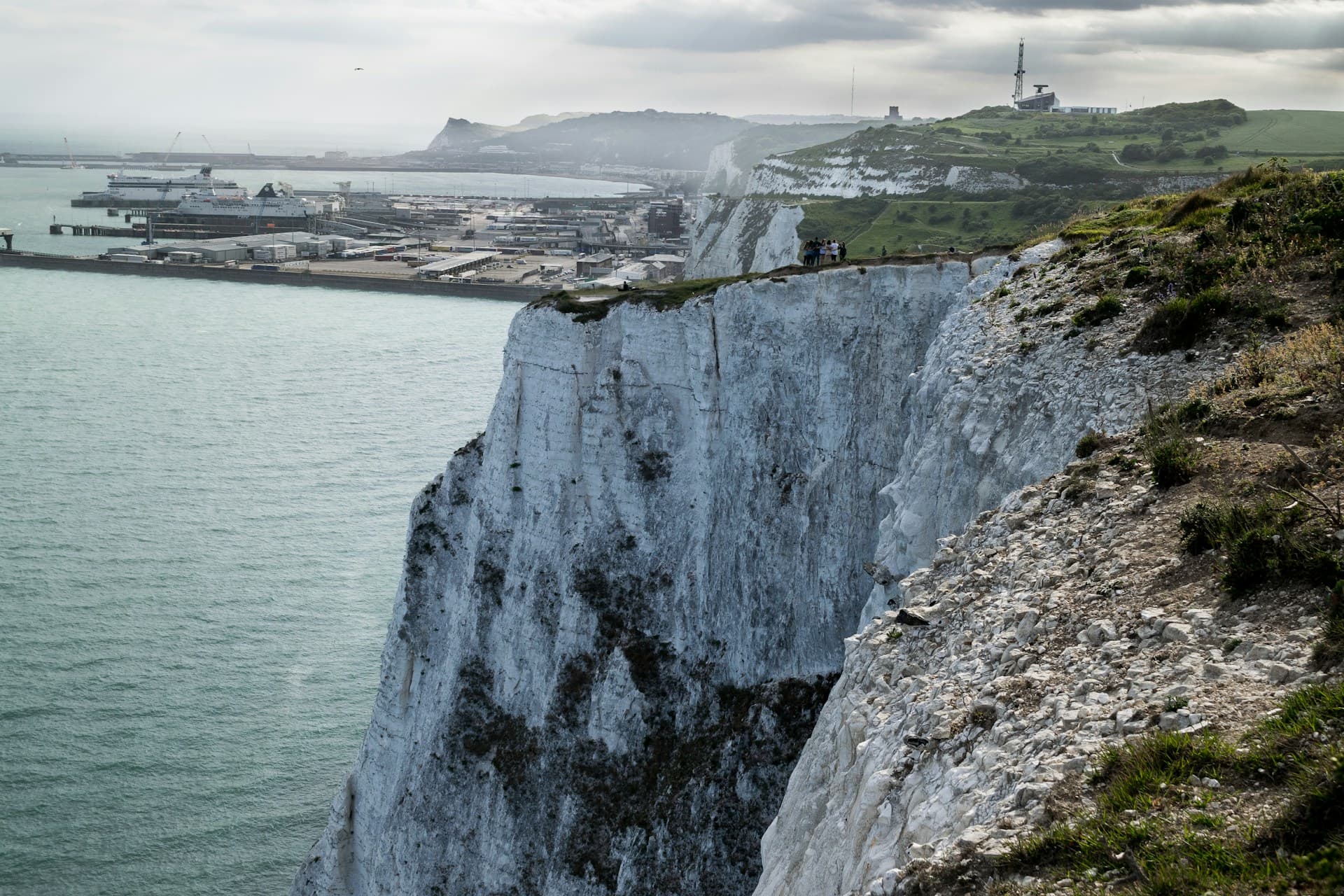 White Cliffs of Dover with Dover port and cross-Channel ferries in the background